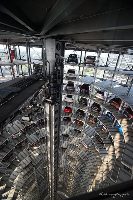 Looking down into a car tower full of parked cars
